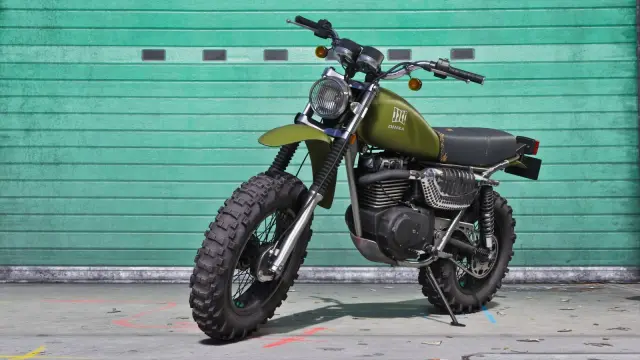 Olive green GTA 6 Dinka Enduro dirt bike parked in front of a teal garage door